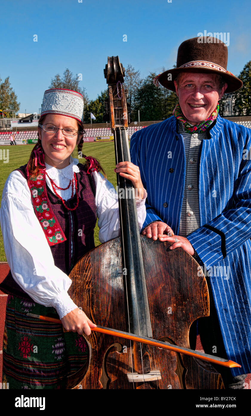Great music traditional dress older couple bass violin hires stock