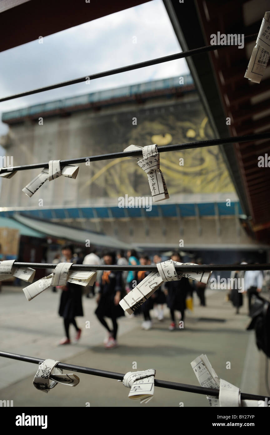 Horoscopes knotted on rods in front of Senso-Ji temple at Sanja Matsuri, Asakusa, Tokyo, Japan Stock Photo