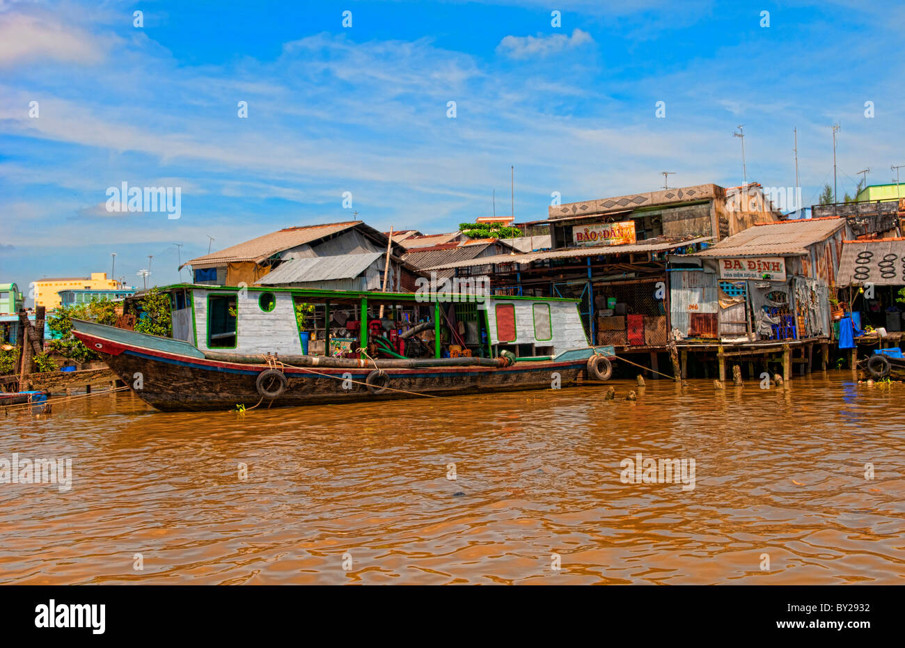 Mekong Delta life on water at river houses slums fishing homesof wood ...