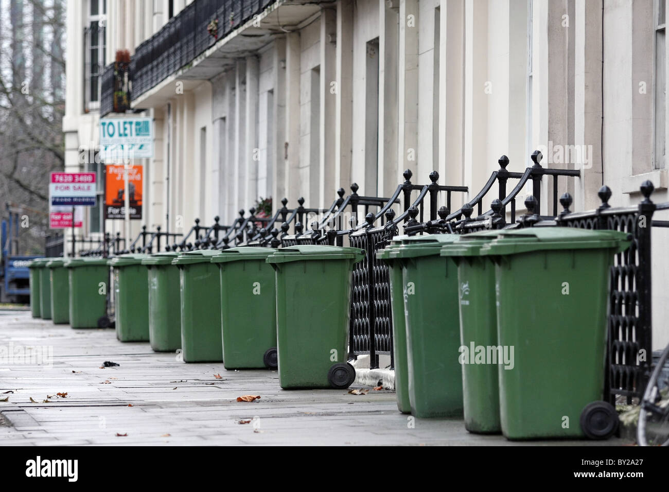 Green wheelie bins hi-res stock photography and images - Alamy