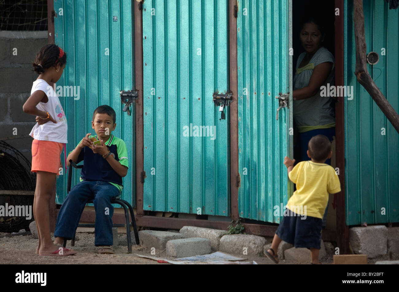 Central American migrants children play in a shelter located along the railroad in Ixtepec, Oaxaca, Mexico. Stock Photo