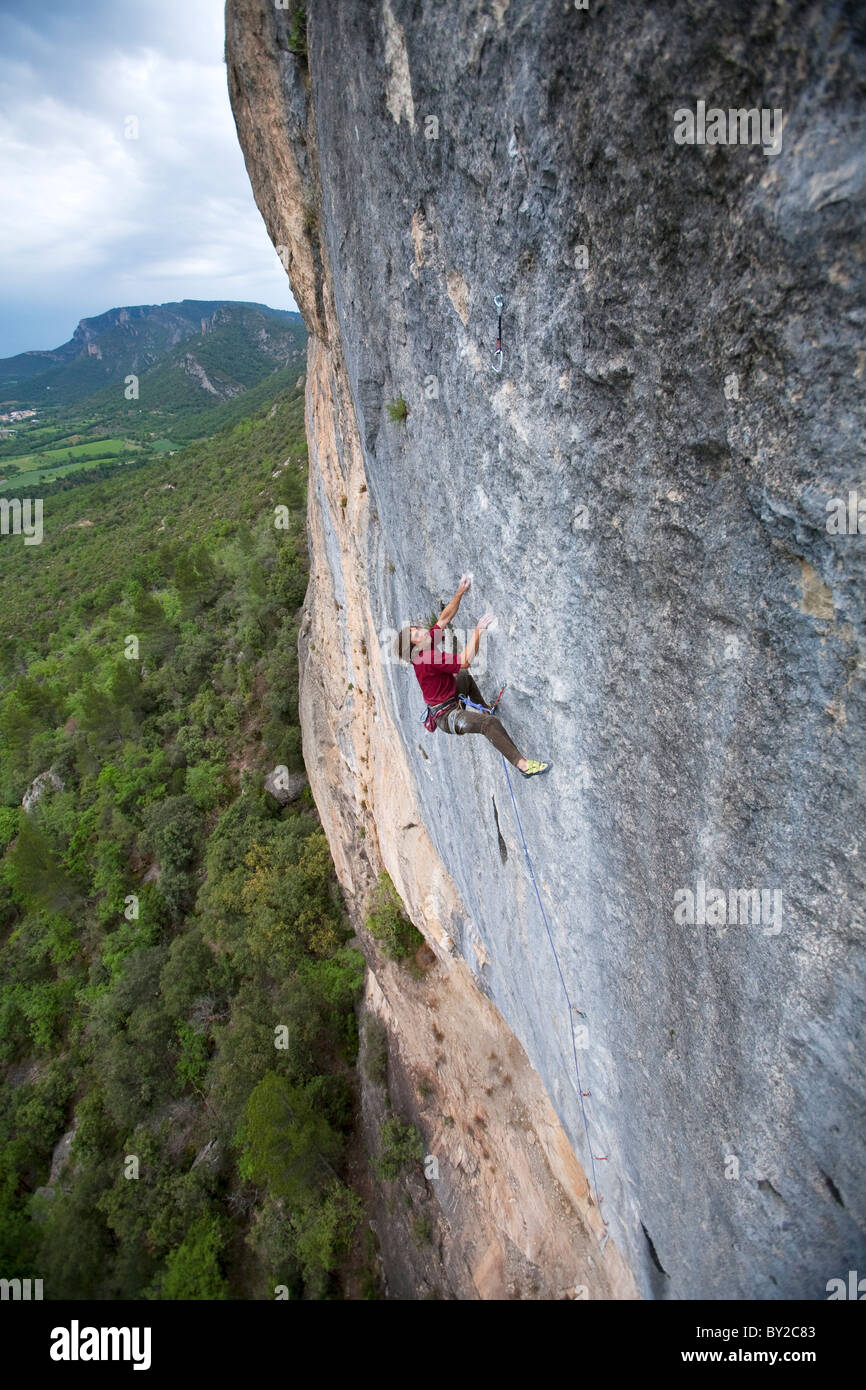 A young man climbing in Oliana, Spain Stock Photo Alamy