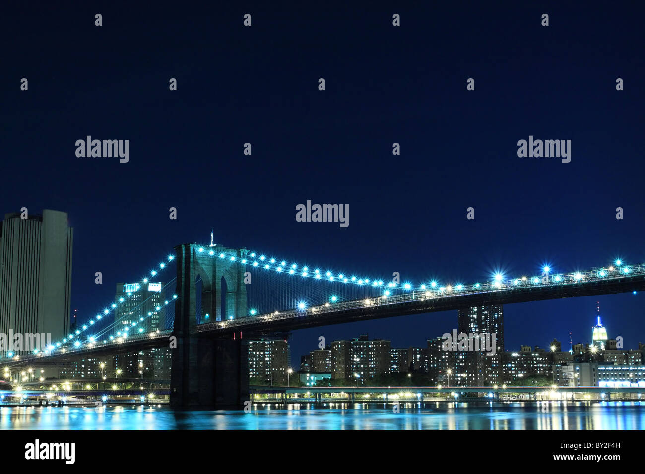 New York City Skyline and Brooklyn Bridge At Night Stock Photo - Alamy
