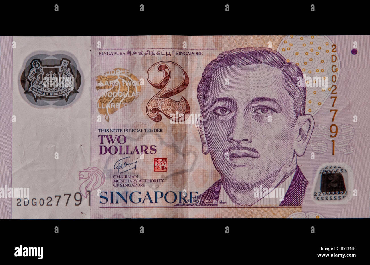 Singapore 2 Dollars money currency paper Stock Photo - Alamy