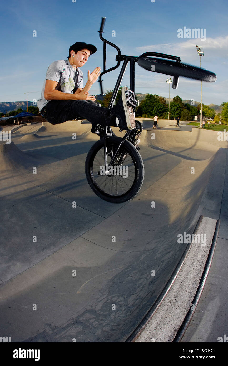 A BMX rider does a barspin on a quarter pipe at the Los Altos Stock Photo - Alamy