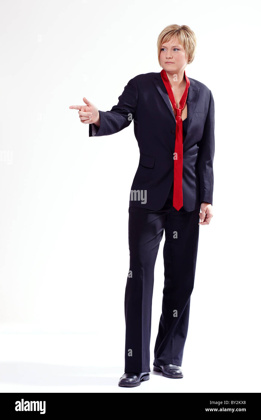 Lady in red suit hi-res stock photography and images - Alamy
