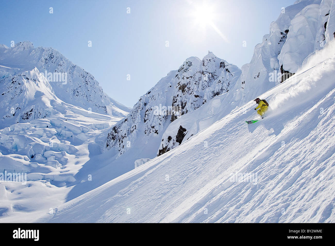 A man skis down a deep snow covered slope in Haines, AK Stock Photo Alamy