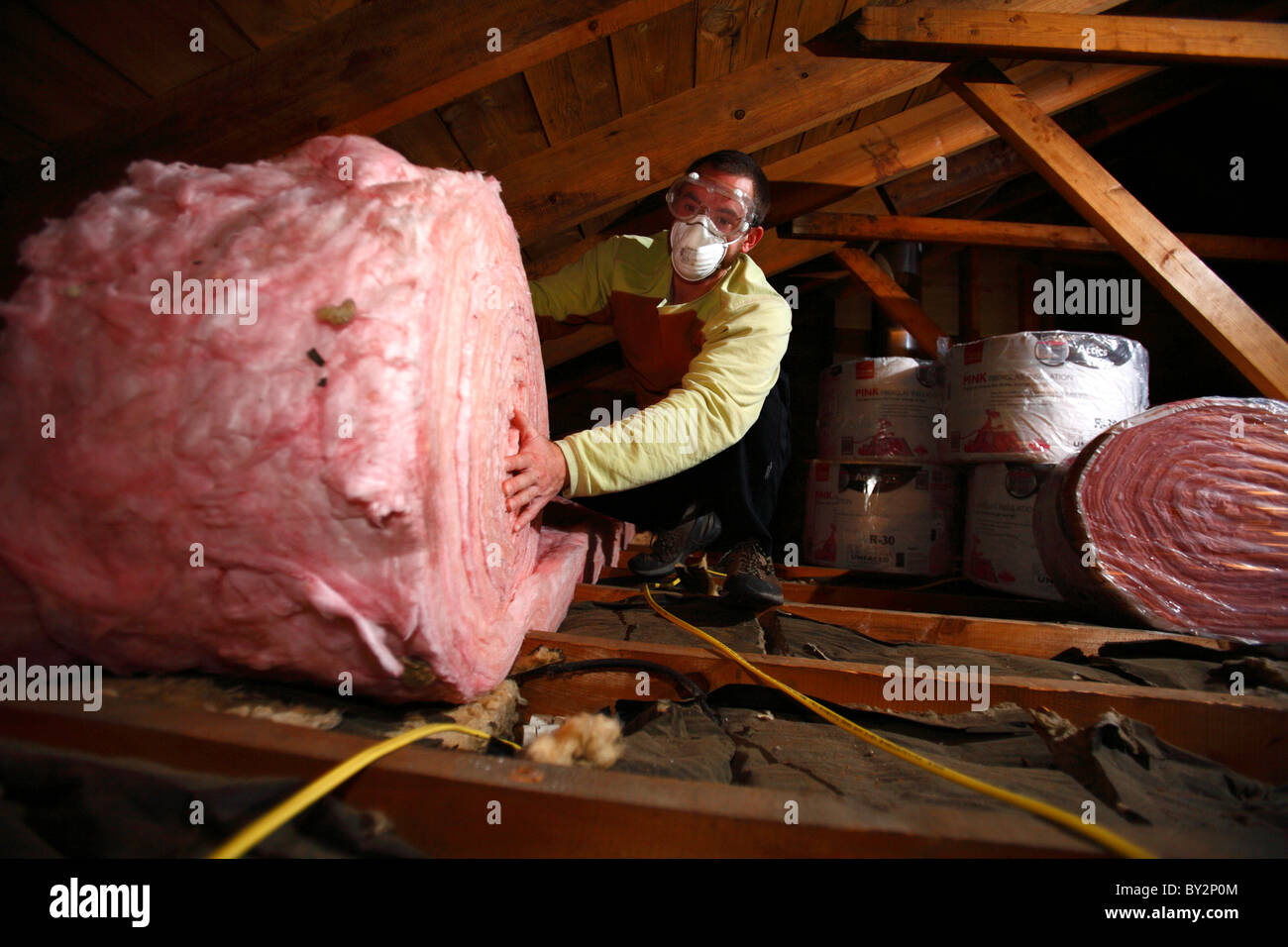 Installing insulation in attic hi-res stock photography and images - Alamy