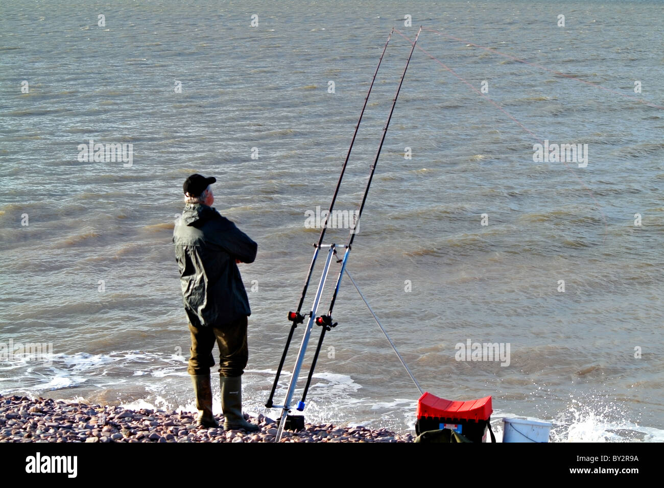 a man caught a fish on a fishing rod, fishing on a Salak, fishing