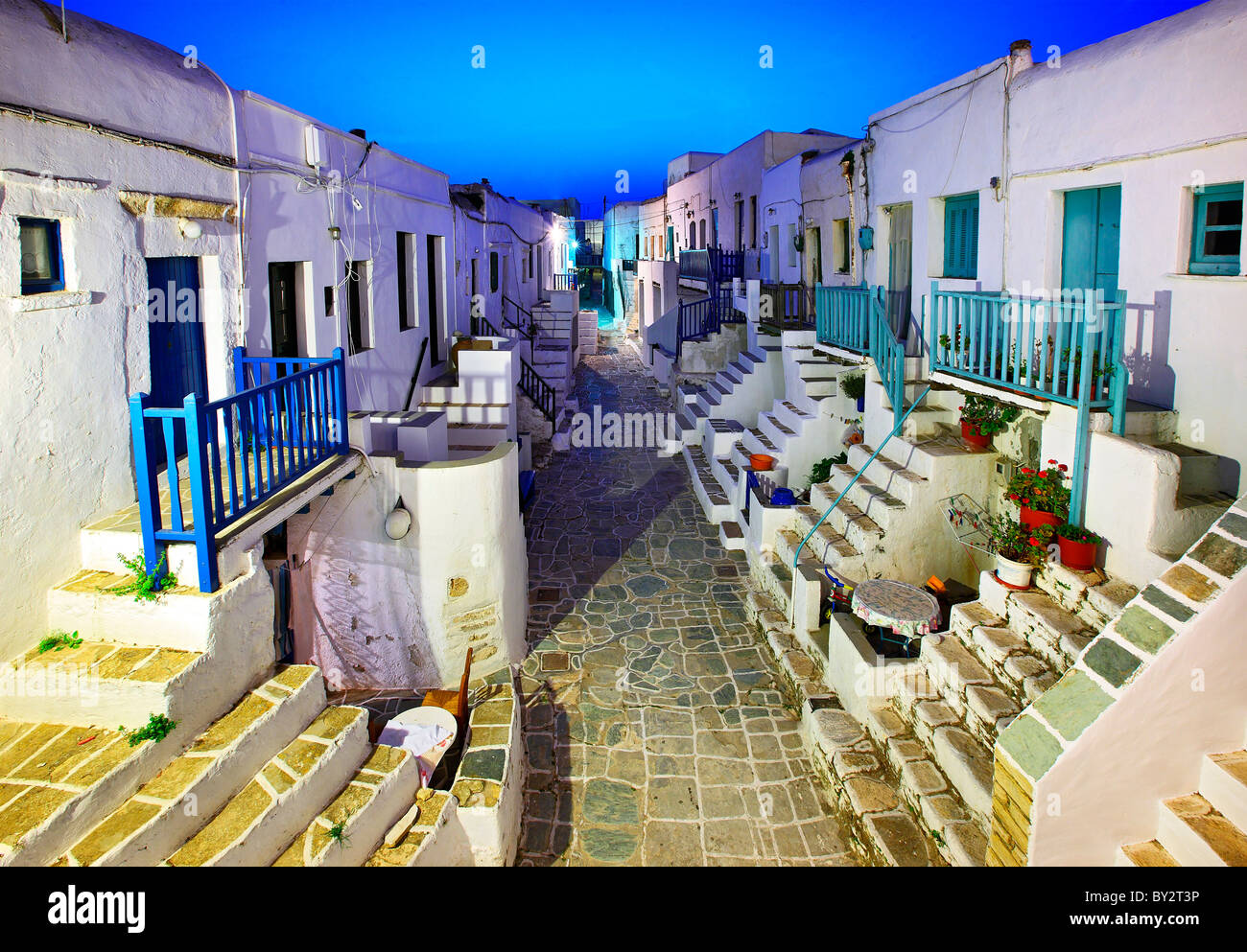 Greece, Folegandros island. The central alley in the Castle of the Chora (the capital of the island) in the "blue" hour Stock Photo