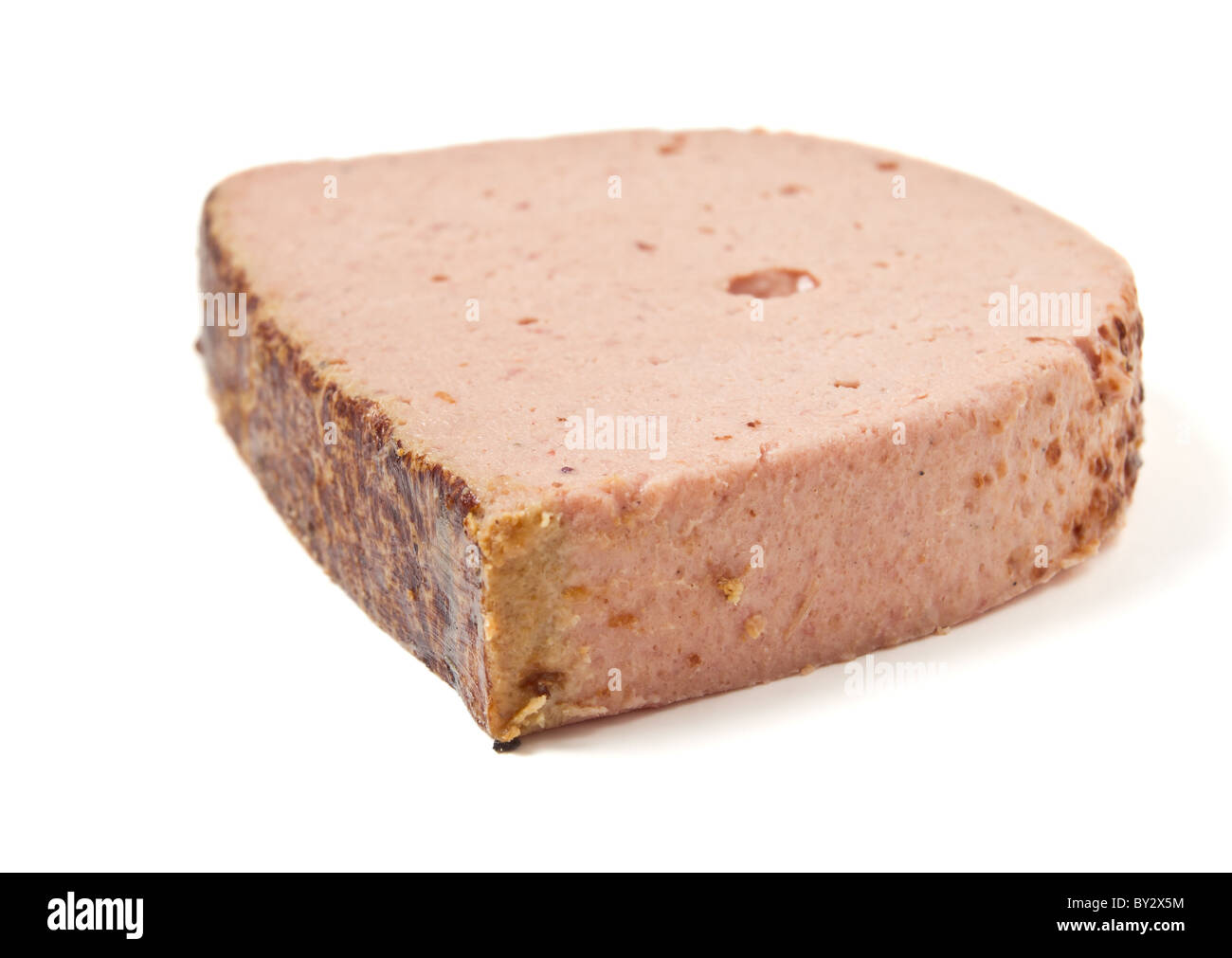 Fresh slice of Liver pate isolated on white. Stock Photo