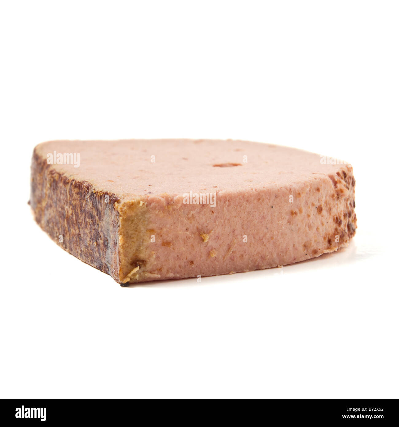 Fresh slice of Liver pate isolated on white. Stock Photo