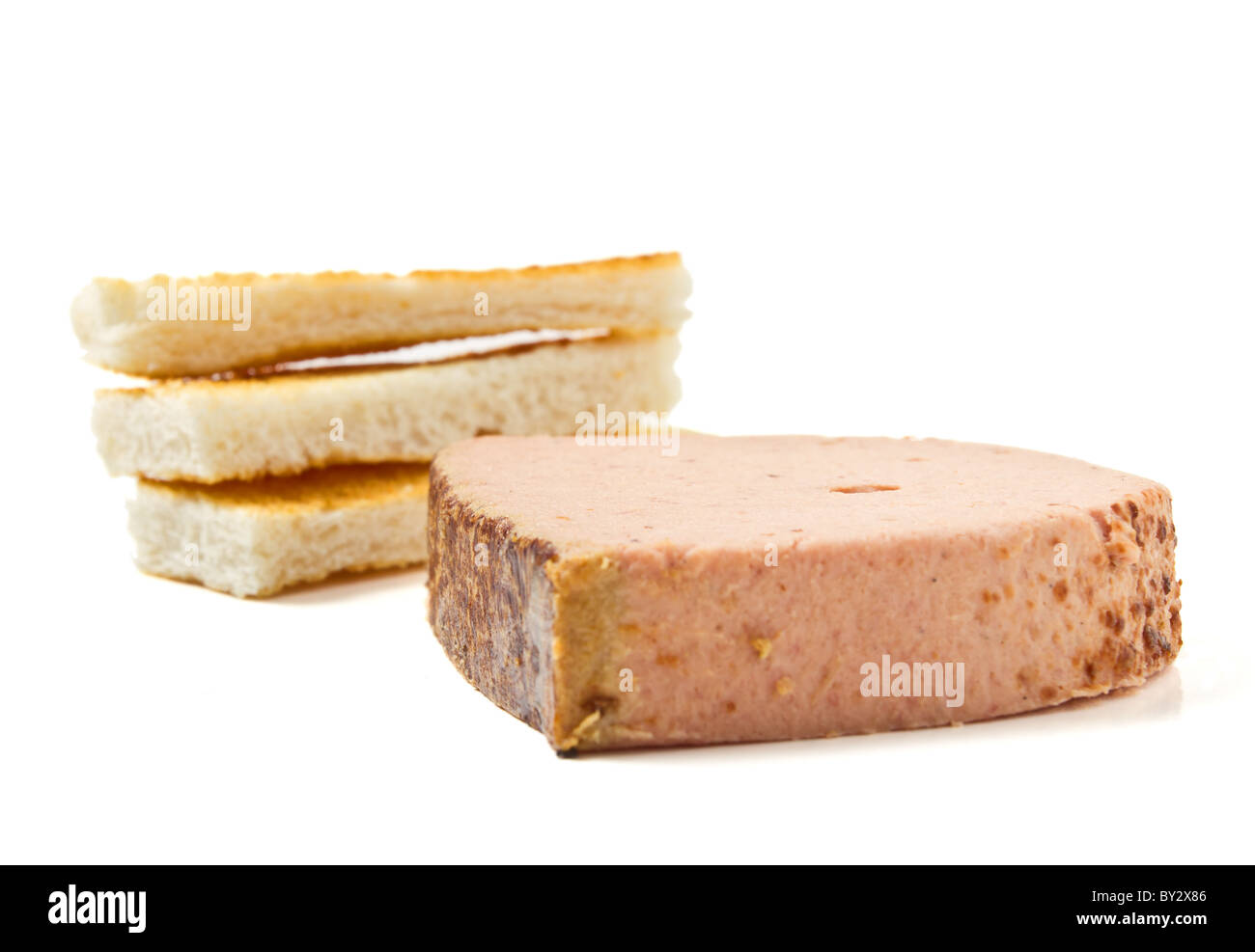 Pate Foie Gras with french toast isolated on white. Stock Photo