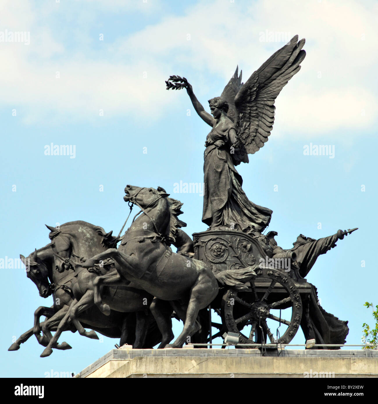 Close up of The bronze Quadriga chariot above Wellington arch a triumphal arch also known as Constitution Arch at Hyde Park Corner London England UK Stock Photo