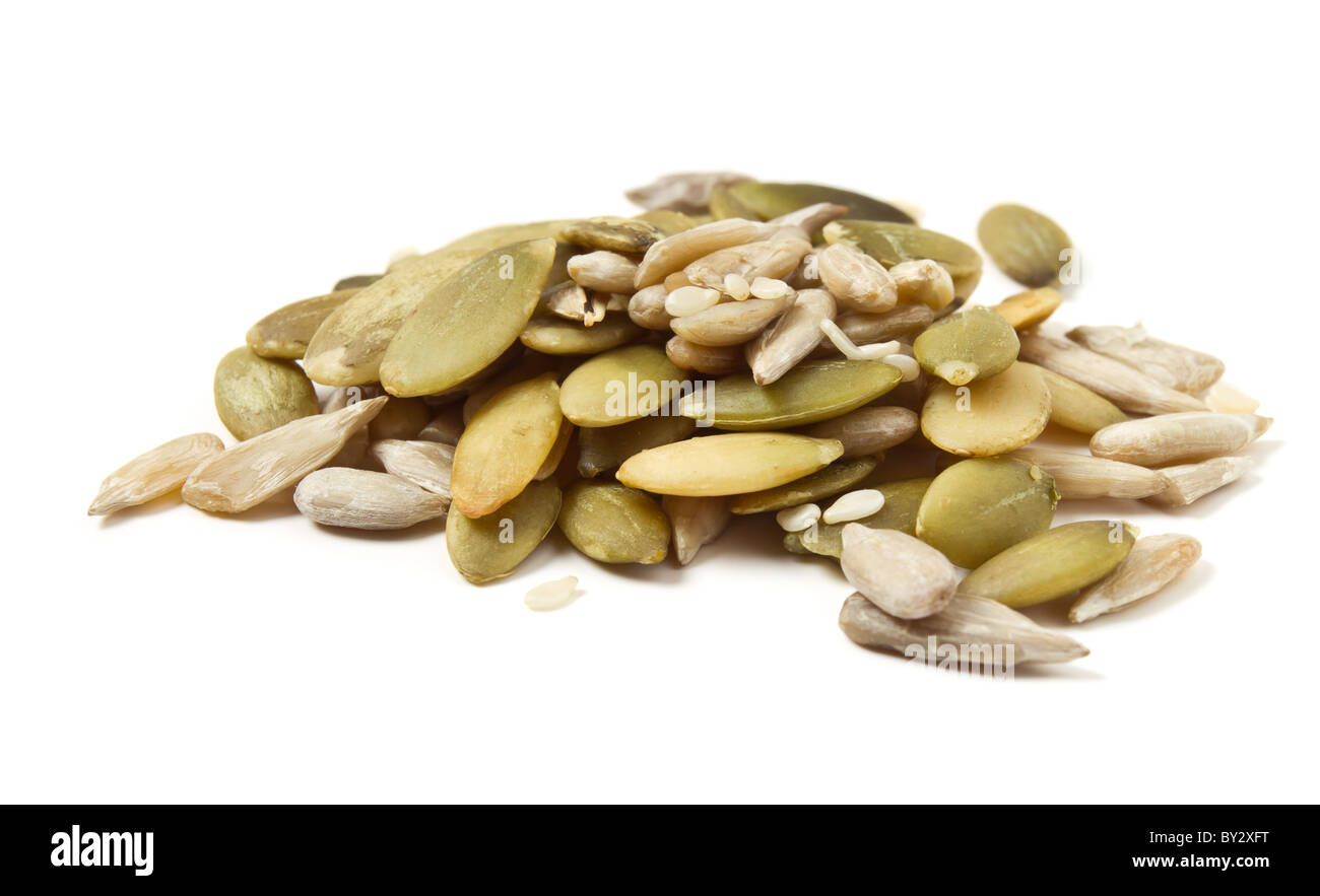 Three seed mixture of Pumpkin, sunflower and sesame seeds isolated on white. Stock Photo