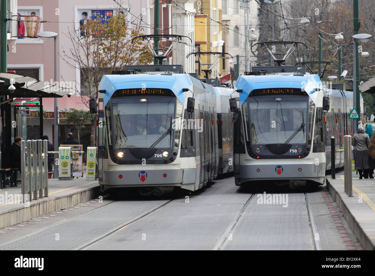 Two Bombardier Flexity Swift low-floor trams passing each other in the streets of Istanbul Stock Photo