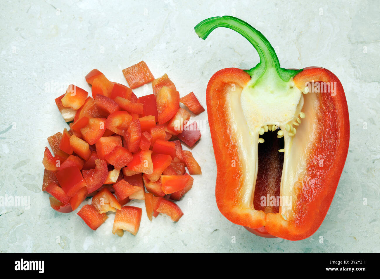 Red Pepper half and chopped Stock Photo