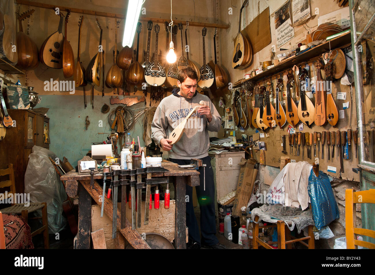 A musical instrument maker in his with a selection of