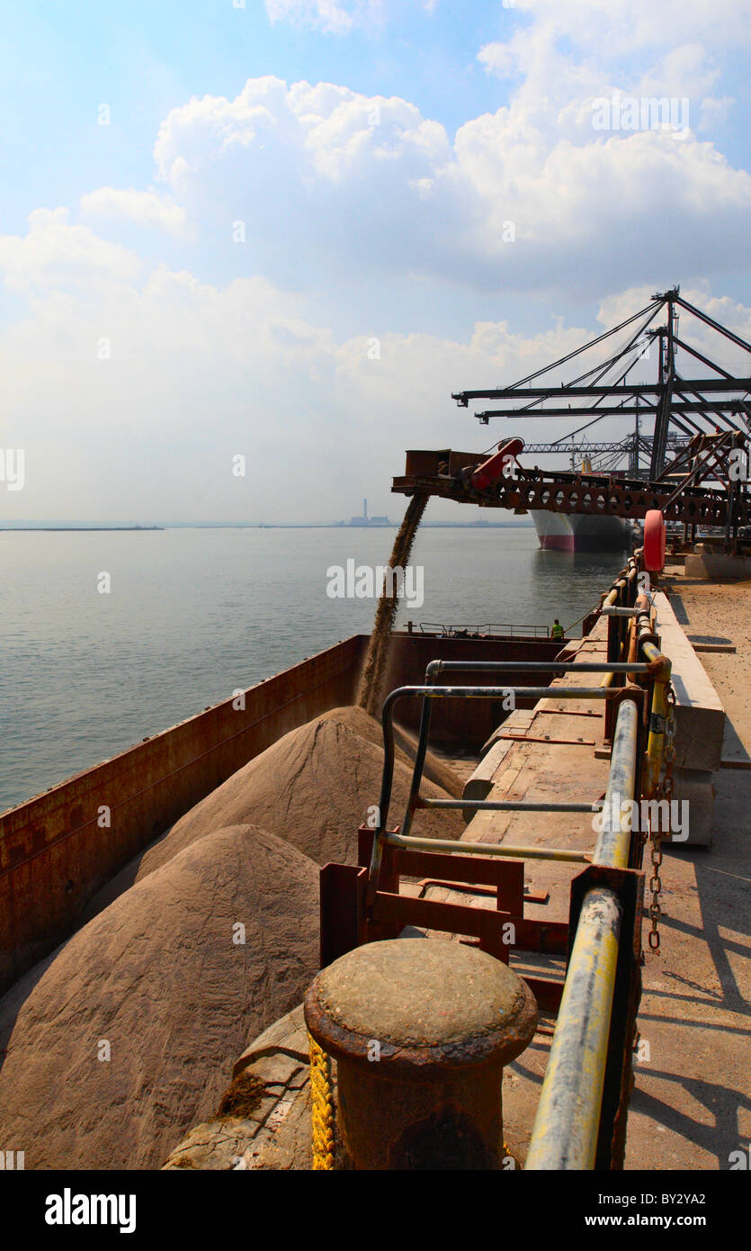 Barge loading feeder conveyor for aggregates export Kent UK Stock Photo