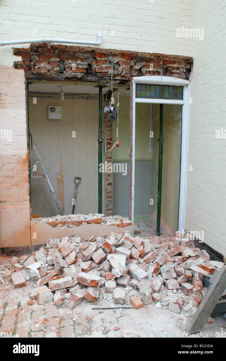 Brick wall removal at house UK Stock Photo