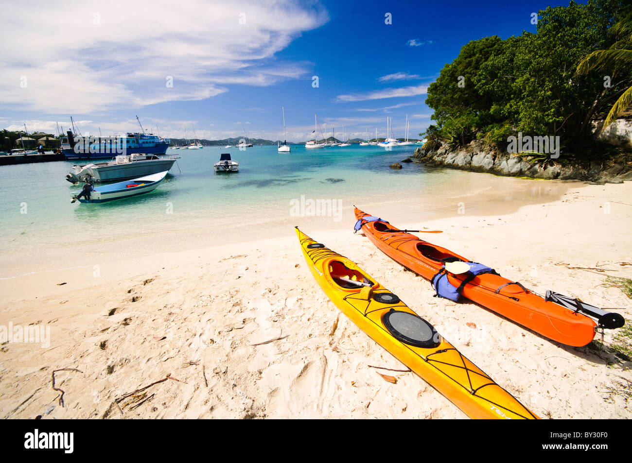 ST JOHN, US Virgin Islands Colorful sea kayaks on the beach at Cruz