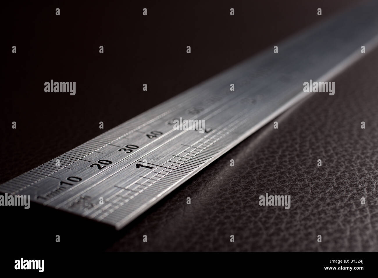 Foxus Ruler A metal ruler in focus at the near end Stock Photo - Alamy