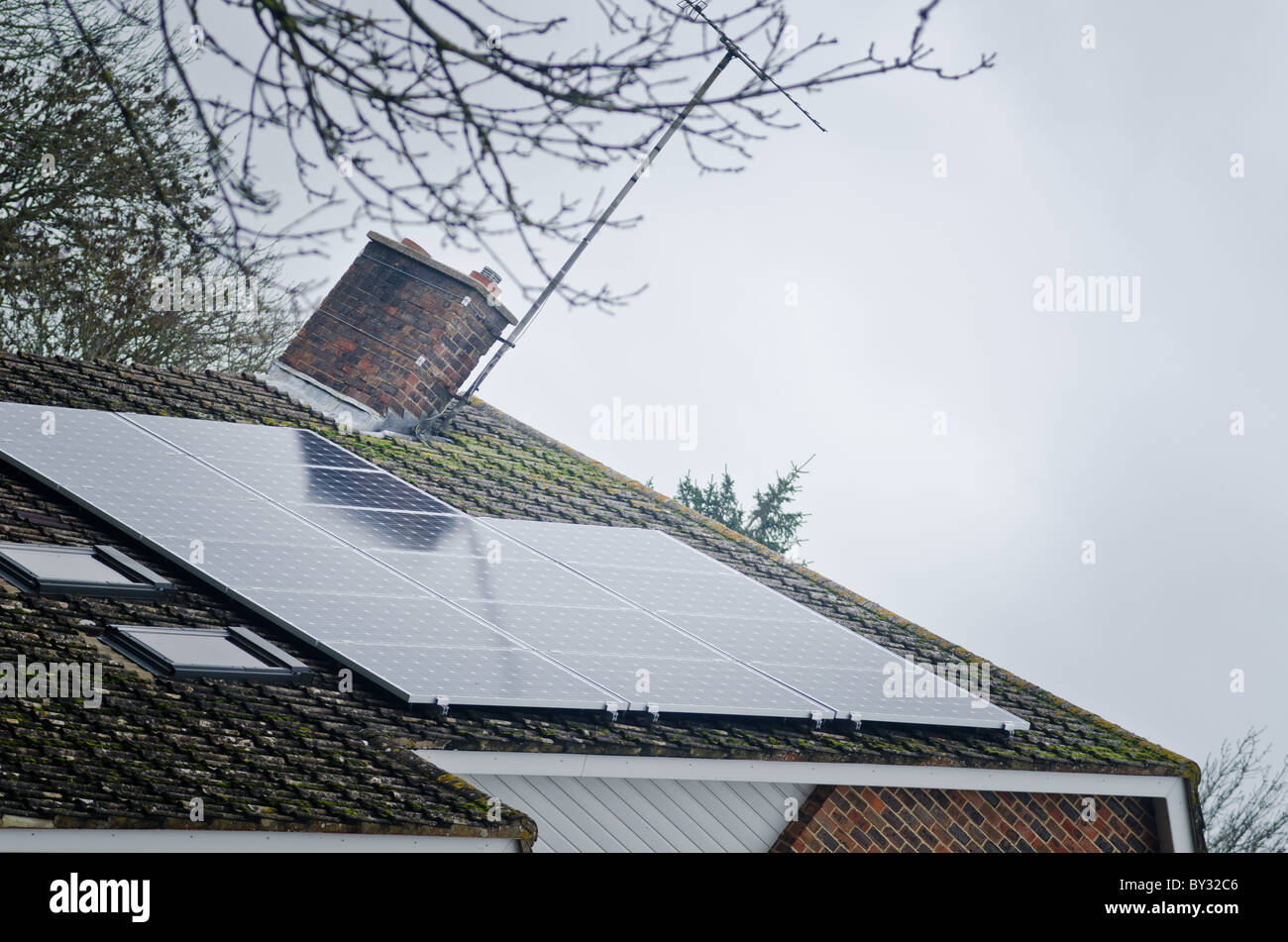 Solar panels on a house roof Stock Photo - Alamy
