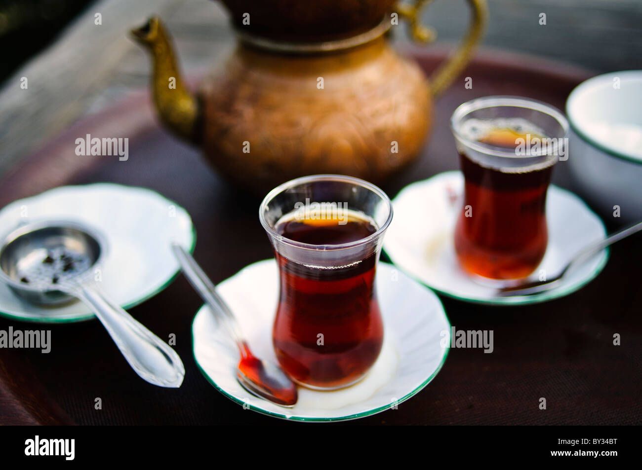 ISTANBUL, Turkey (Türkiye) — Turkish tea served in an old copper teapot