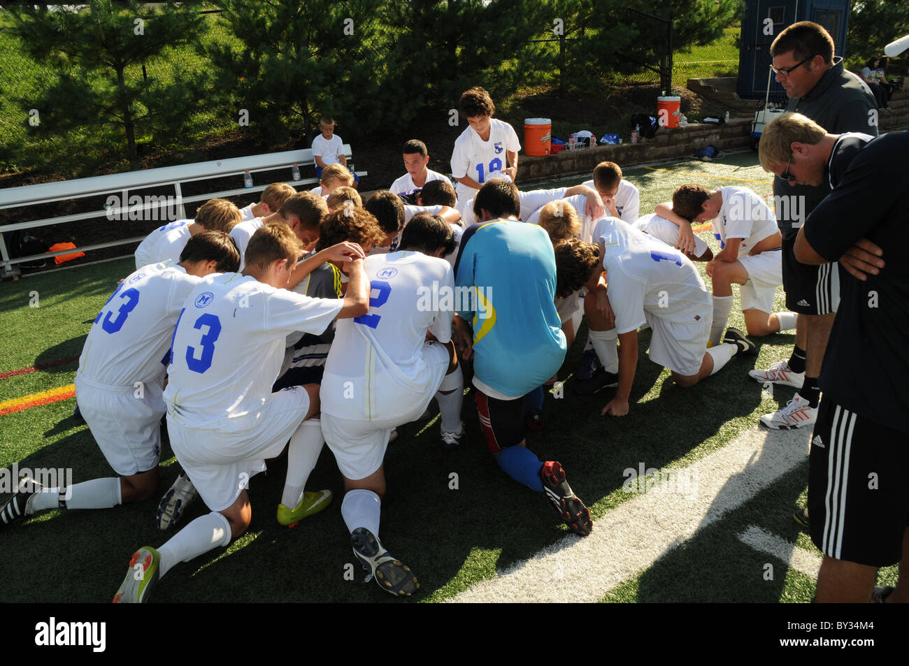 Pray before game hi-res stock photography and images - Alamy