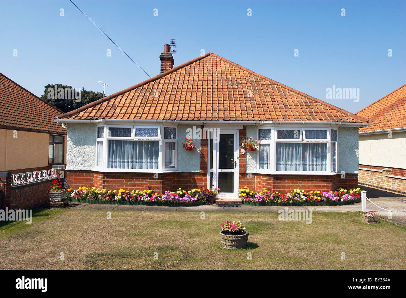 Front facade of a 1960's semi-detached bungalow Stock Photo - Alamy