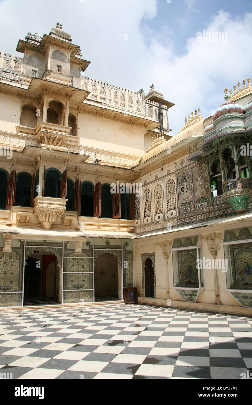 Ornate open air inner Peacock Courtyard Mor Chowk at the City Palace Udaipur Rajasthan Stock Photo