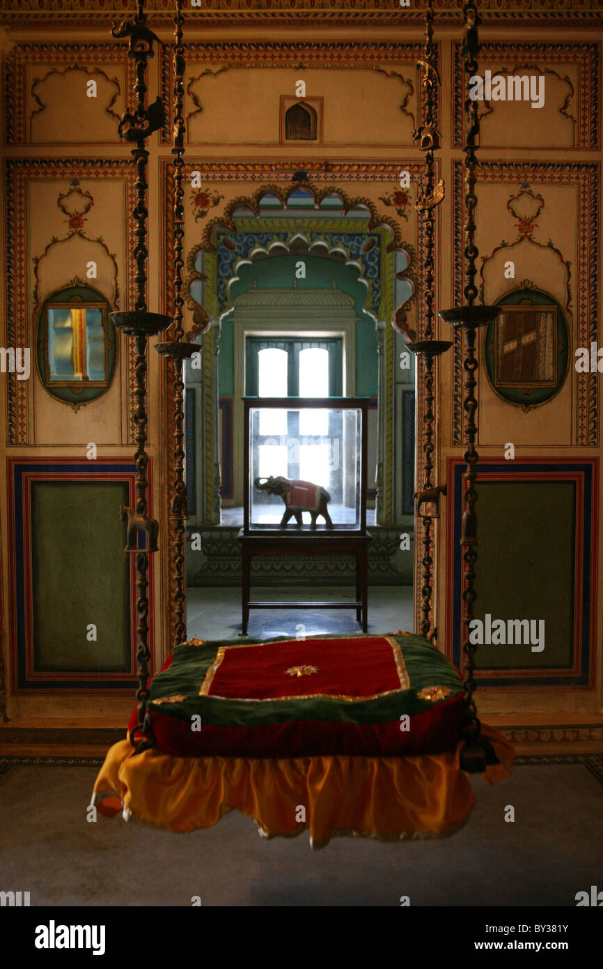 Royal swing crib in the Manak Mahal Ruby Palace at City Palace Udaipur Rajasthan Stock Photo