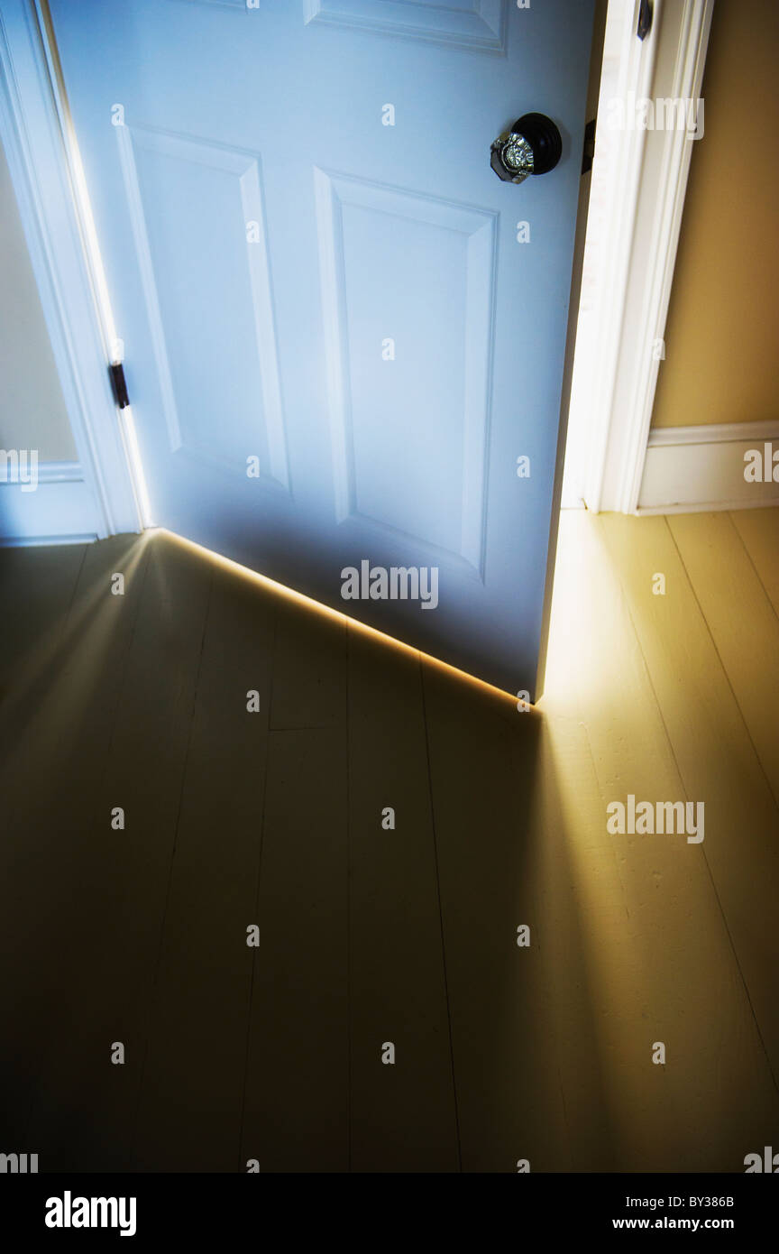 Sunlight shining through open door Stock Photo Alamy