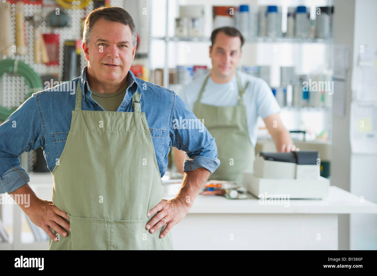 USA, New Jersey, Jersey City, Portrait of hardware shop owner and assistant Stock Photo