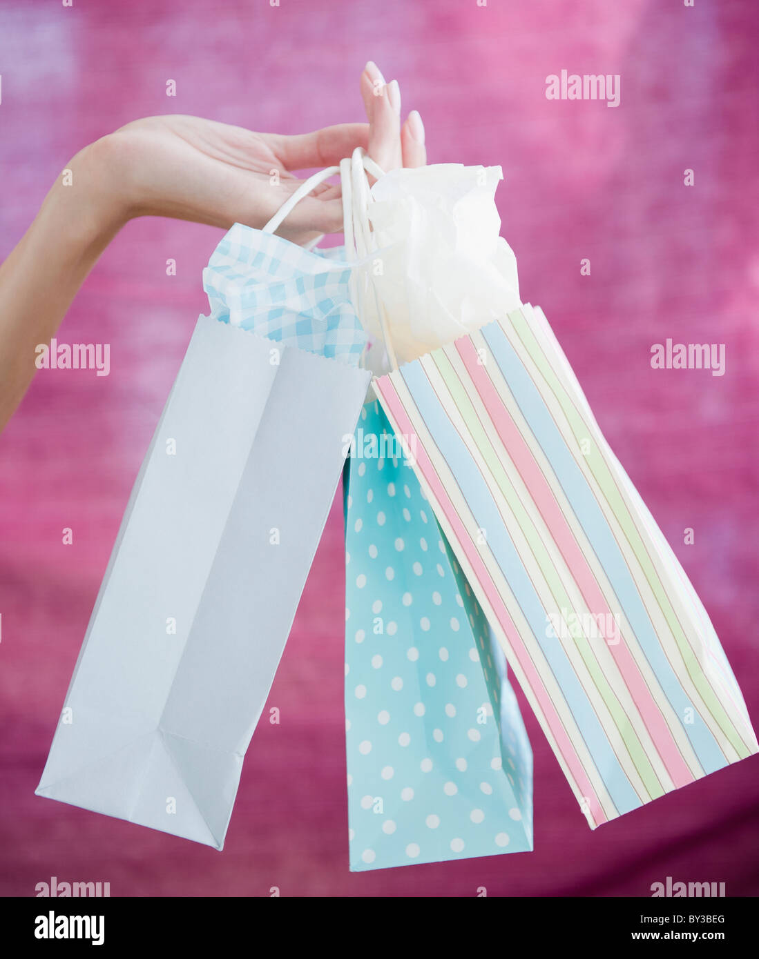 USA, New Jersey, Jersey City, Close-up view of woman's hand holding shopping bags Stock Photo