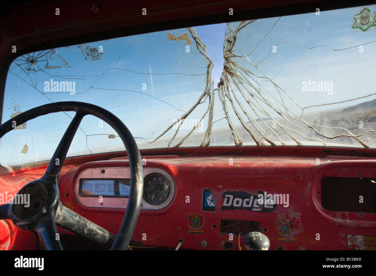 Looking through the broken windscreen of an abandoned truck, Bolivia Stock Photo