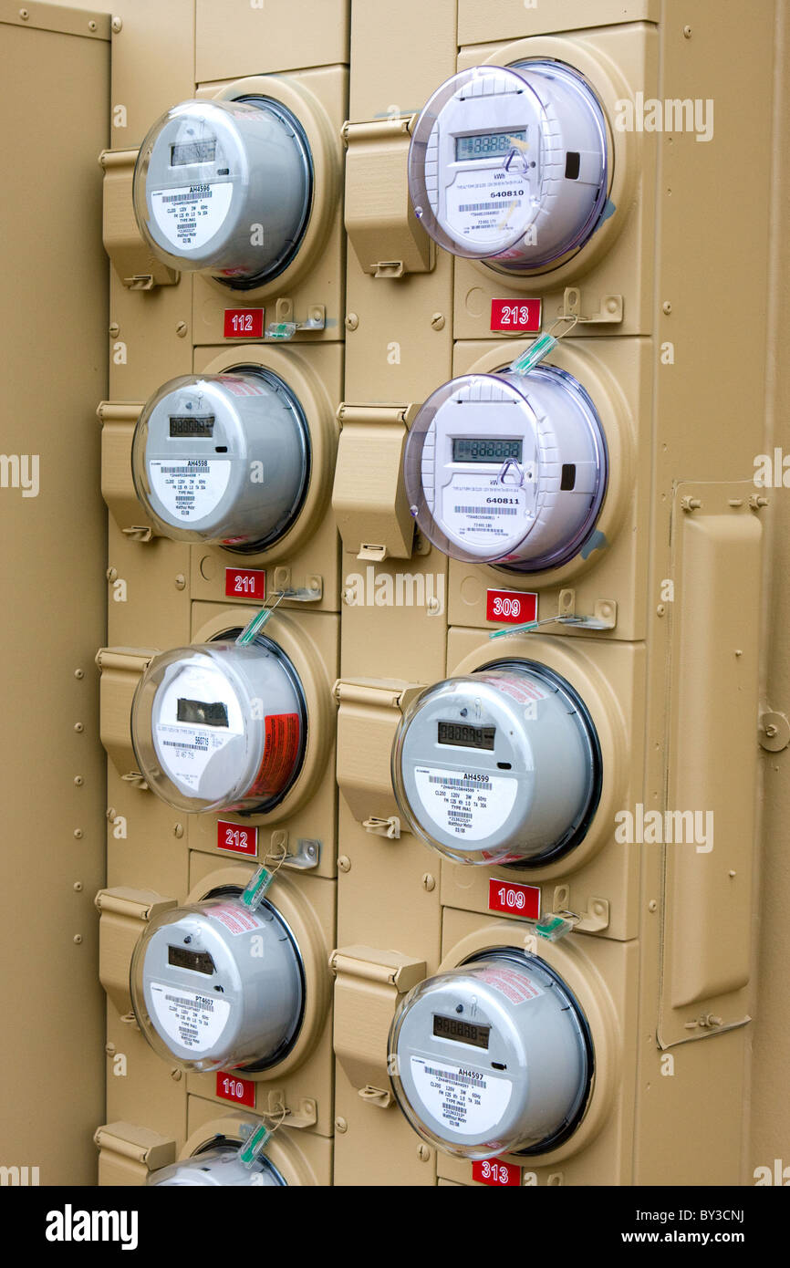 Rows of electric meters line the outside wall of a new apartment building Stock Photo Alamy