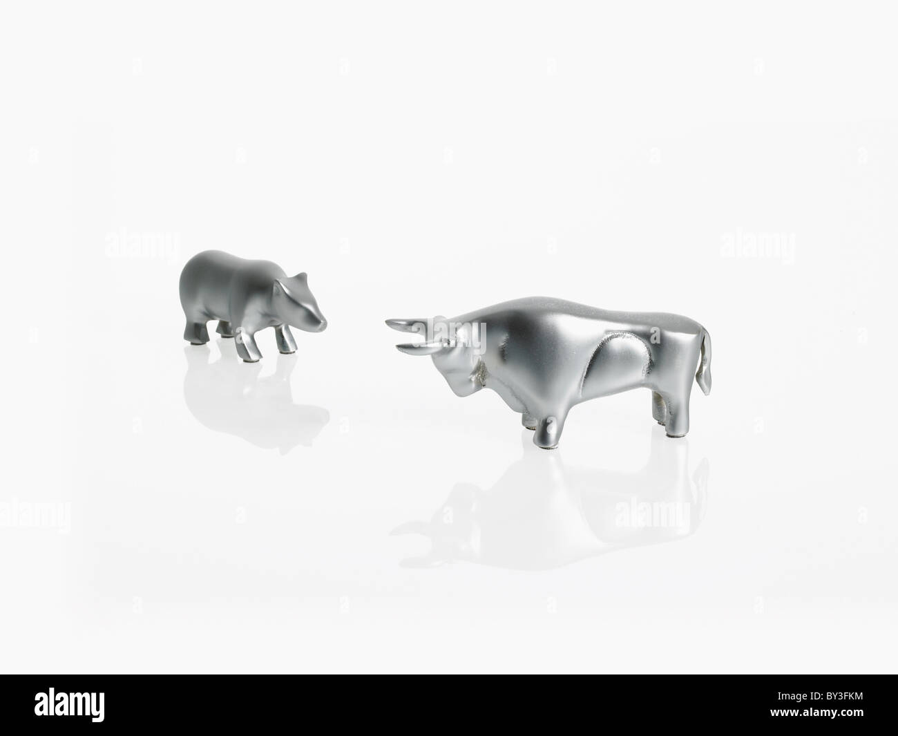 Studio shot of silver figurines of bull and bear Stock Photo