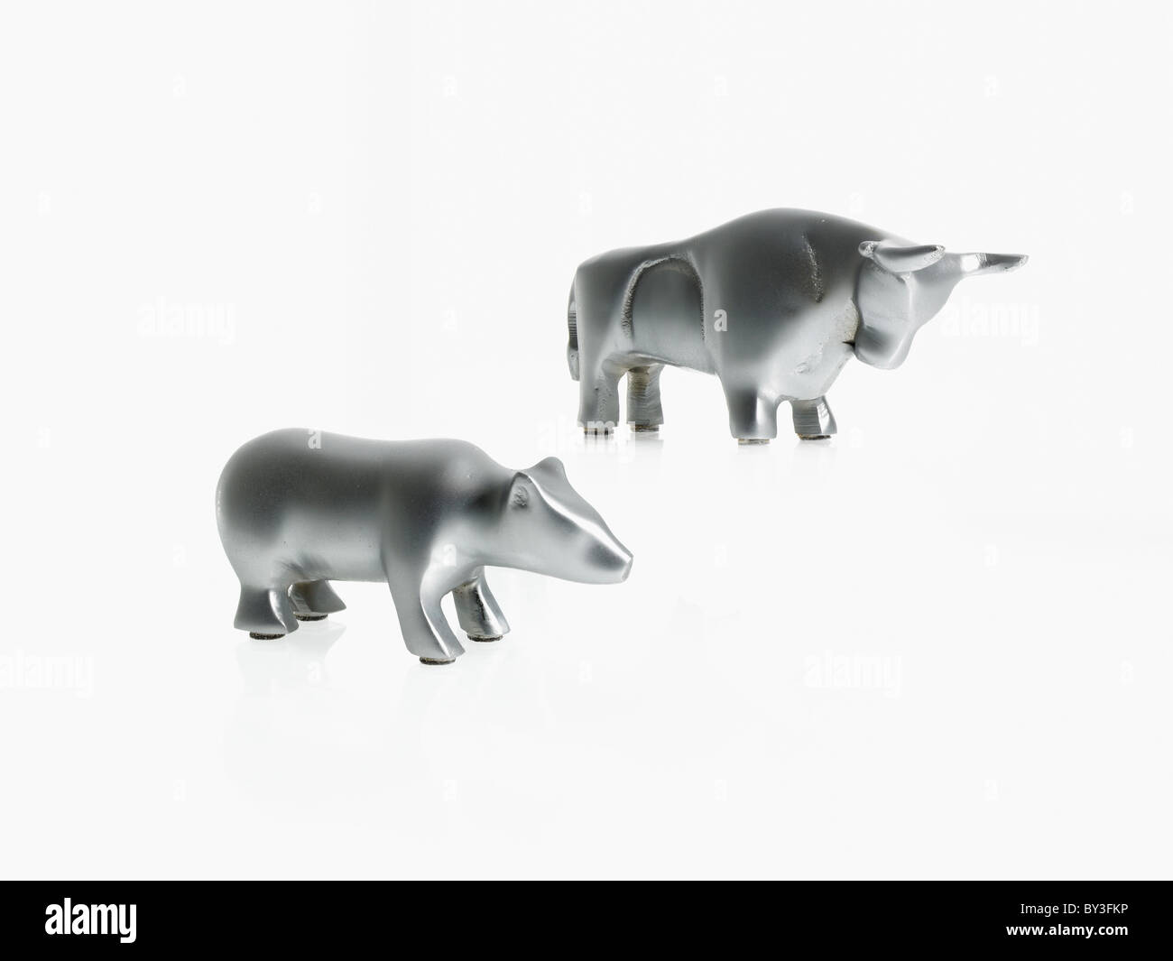 Studio shot of silver figurines of bull and bear Stock Photo