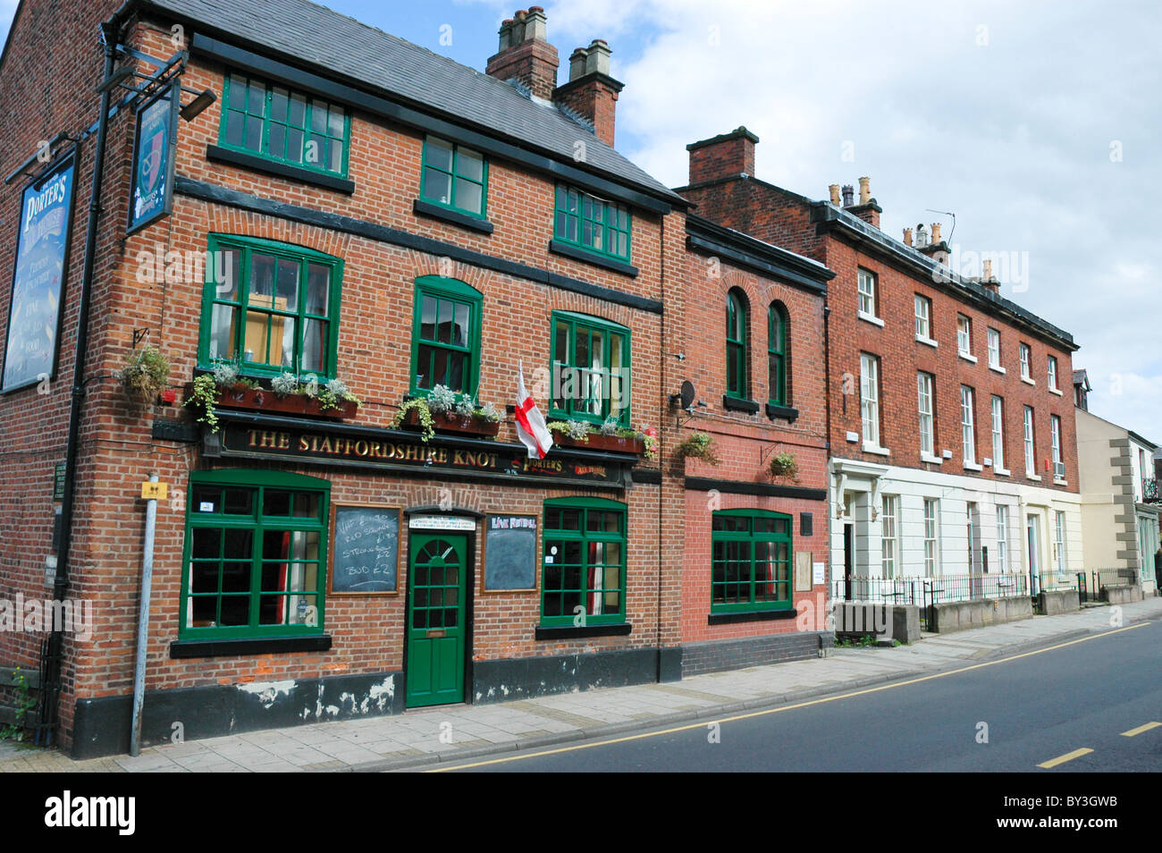 Traditional northern English pub; part of a typical small town street scene. Stock Photo