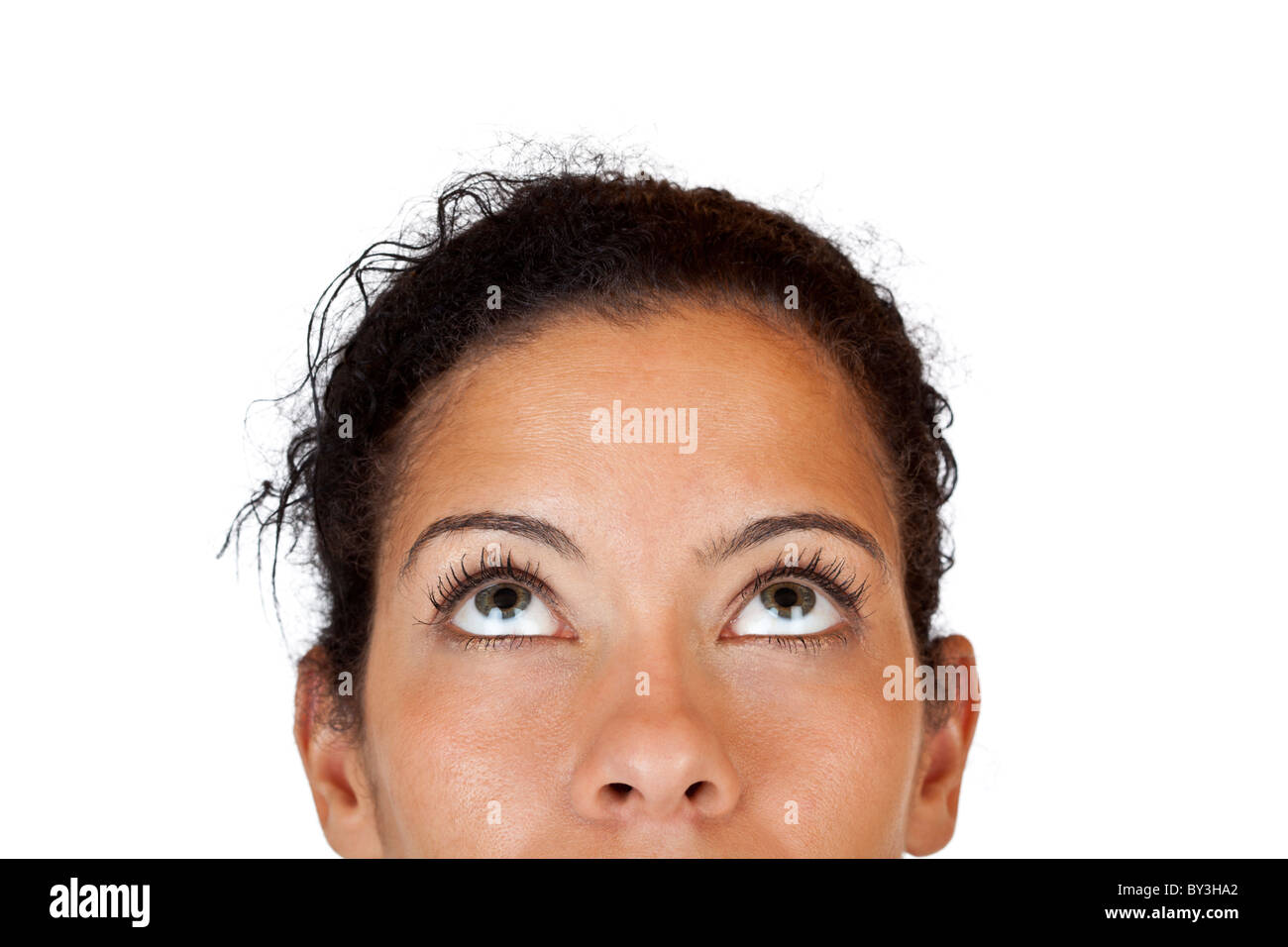 Close-up makro of woman looking up. Isolated on white background. Stock Photo