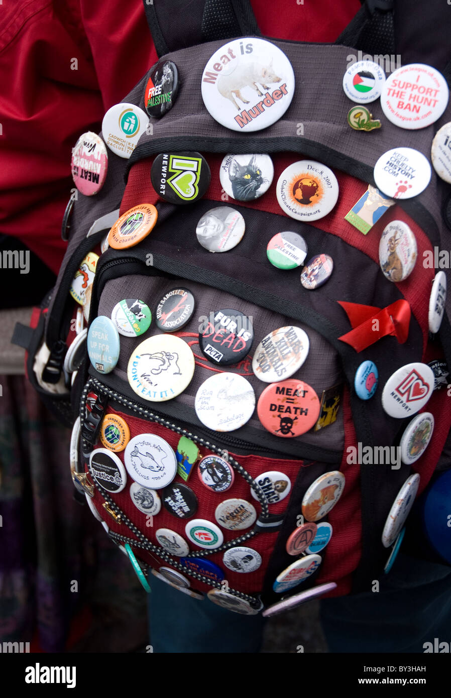 a rucksack covered in badges Stock Photo