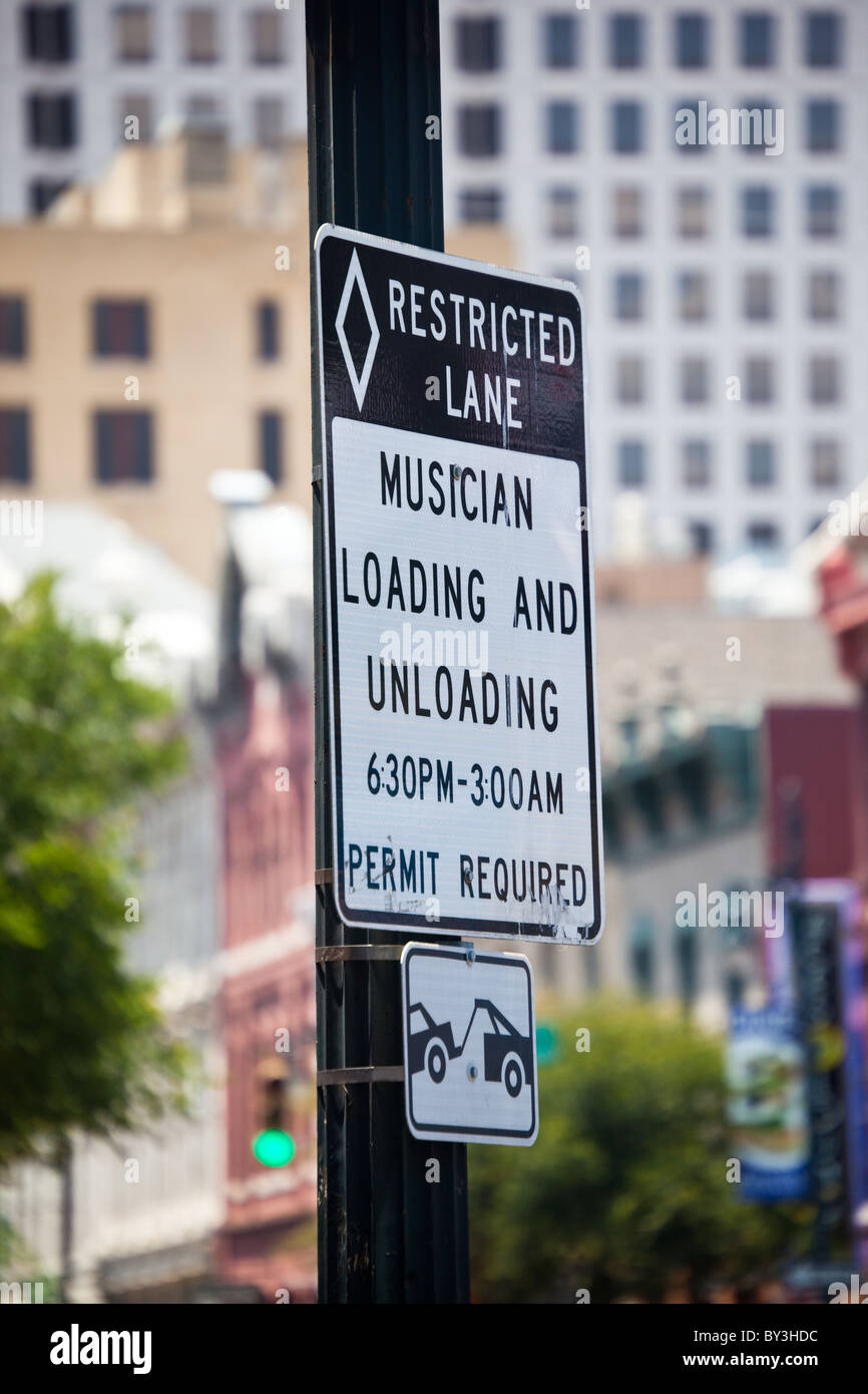 Sign indicating Restricted lane musician loading and unloading in ...