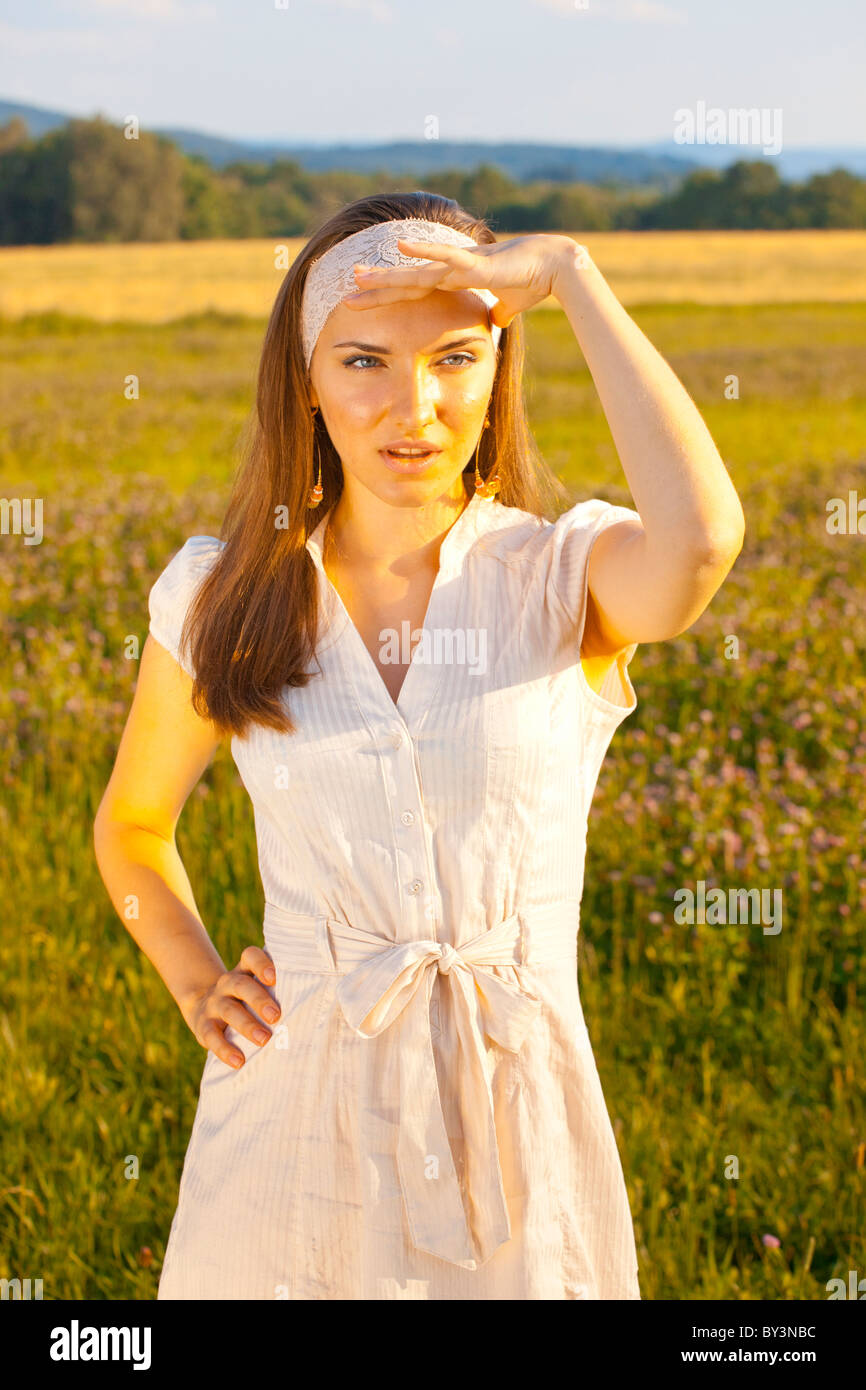 Portrait of a young woman in summer dress Stock Photo - Alamy