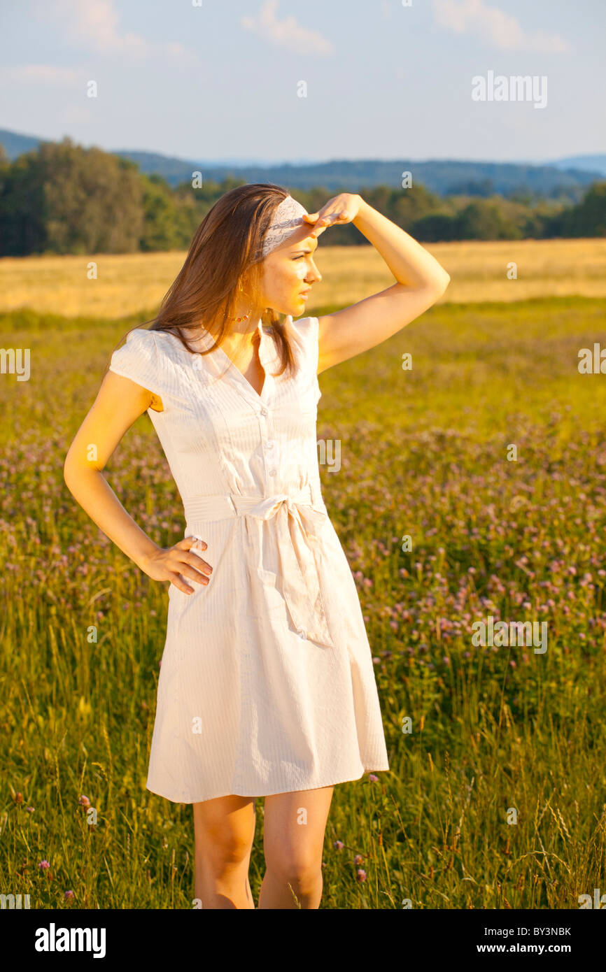 Portrait of a young woman in summer dress Stock Photo - Alamy