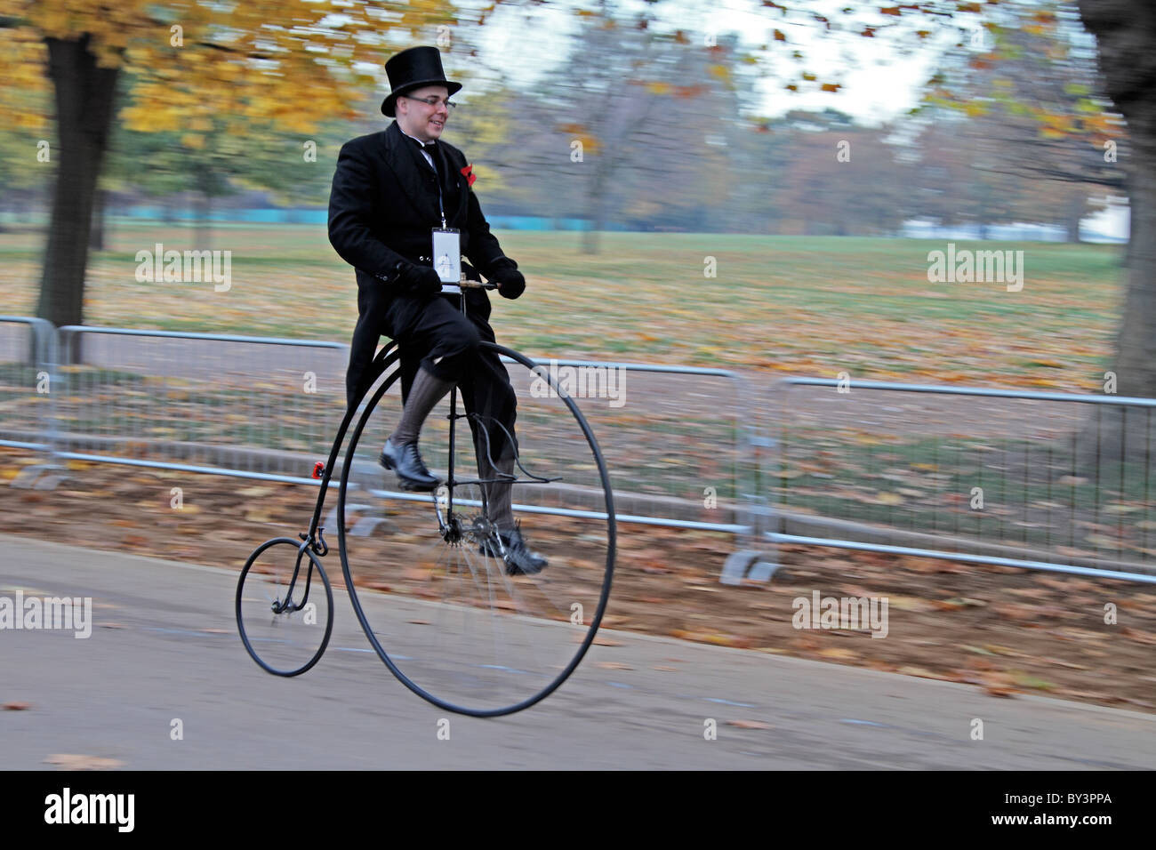 Penny Farthing bicycle rider victorian costume Hyde Park London Stock Photo