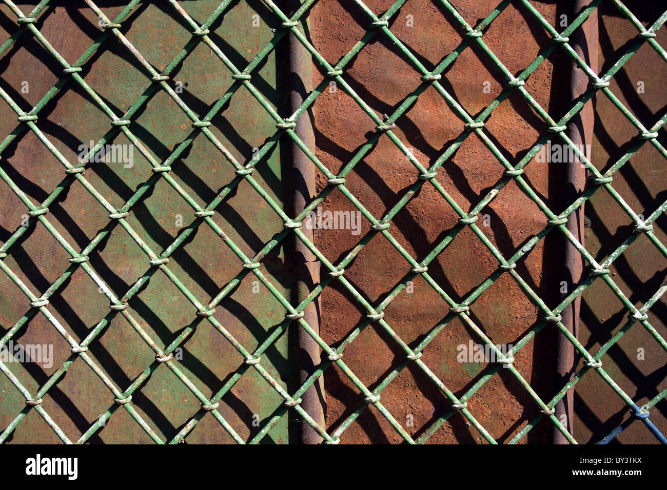 Metal rusty grid old fence background Stock Photo - Alamy