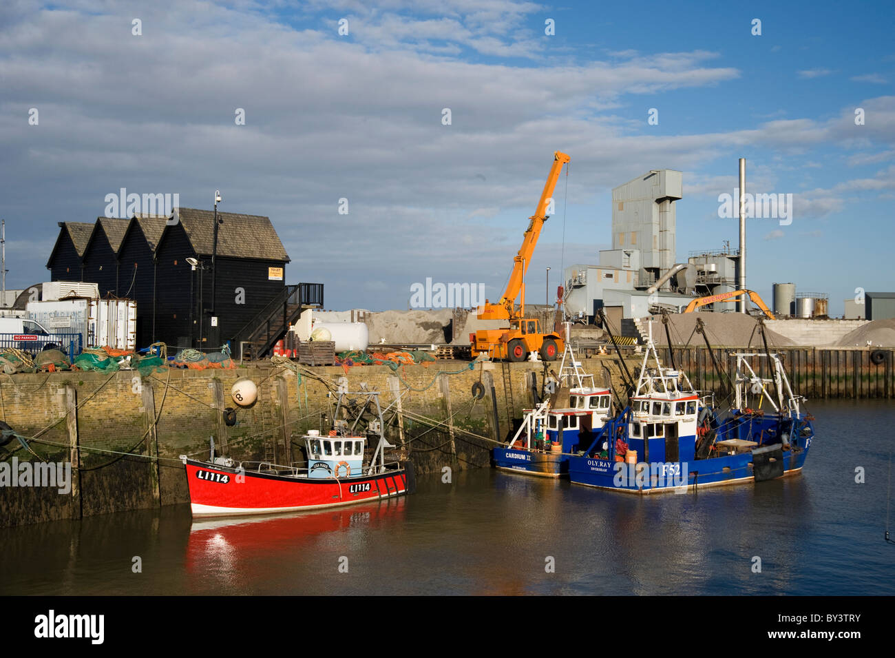 whitstable fishing boats in harbour Stock Photo - Alamy