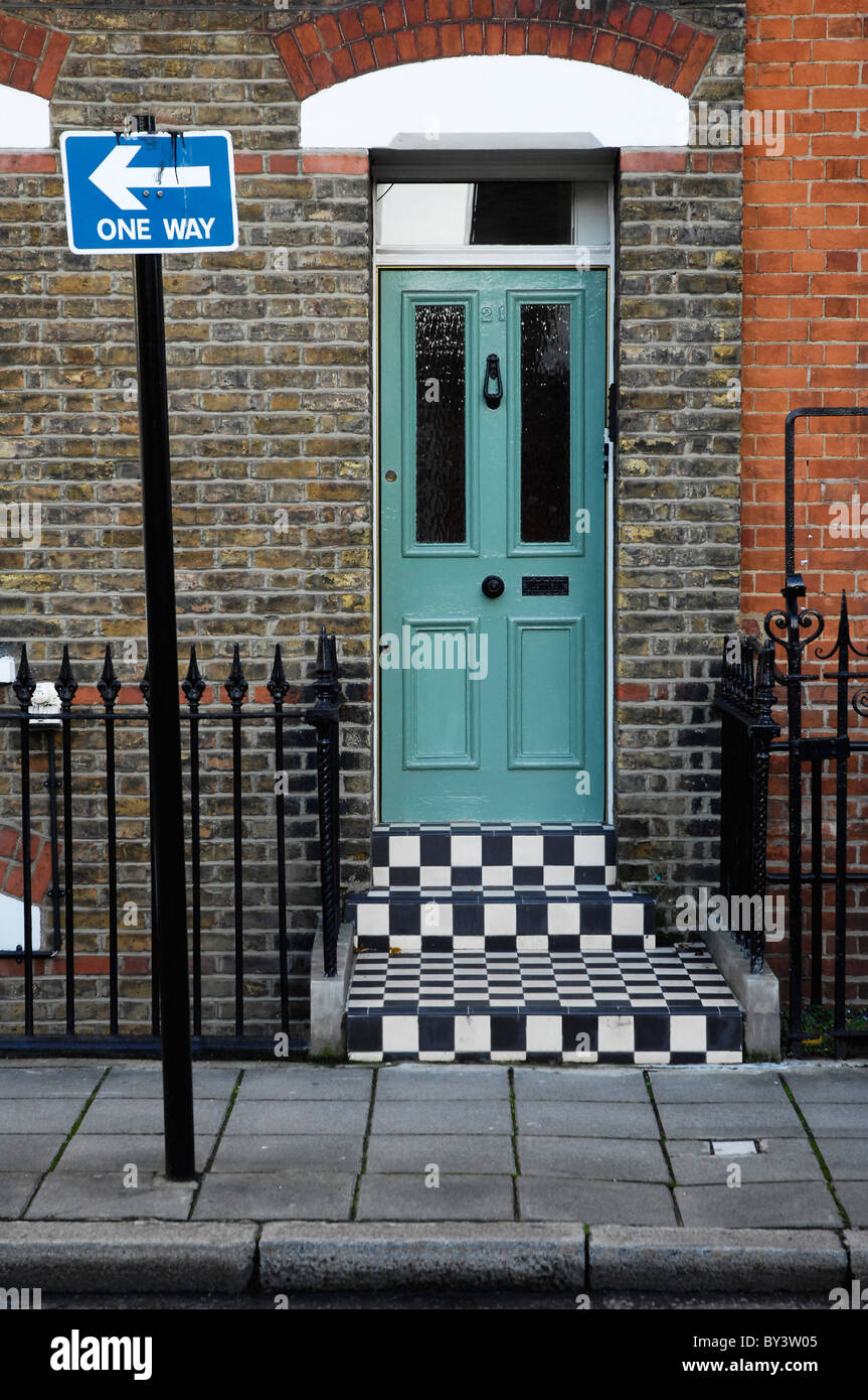 green front door number railings wall PT Stock Photo - Alamy