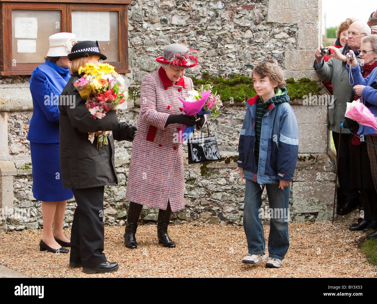 Britain's Queen Elizabeth, accompanied by Prince Philip attends a Sunday morning service in Hillington, Norfolk Stock Photo